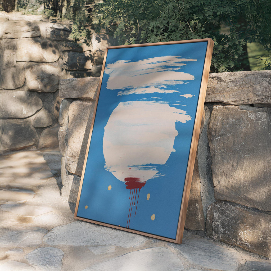 May include: Abstract art piece with a blue background, featuring white brushstrokes and a large white circle. Red paint drips from the bottom, with gold accents. The artwork is framed in a natural wood frame.