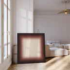 May include: A large, square canvas with a blurred, gradient design. The outer border is a deep brown, transitioning to a lighter, beige center. The artwork is displayed in a bright, modern room with a large window.