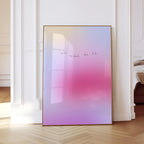 May include: A framed art print with a gradient of colors, transitioning from yellow to pink and purple. The artwork features the handwritten text "you are my favorite place to be". The frame is a warm gold color.