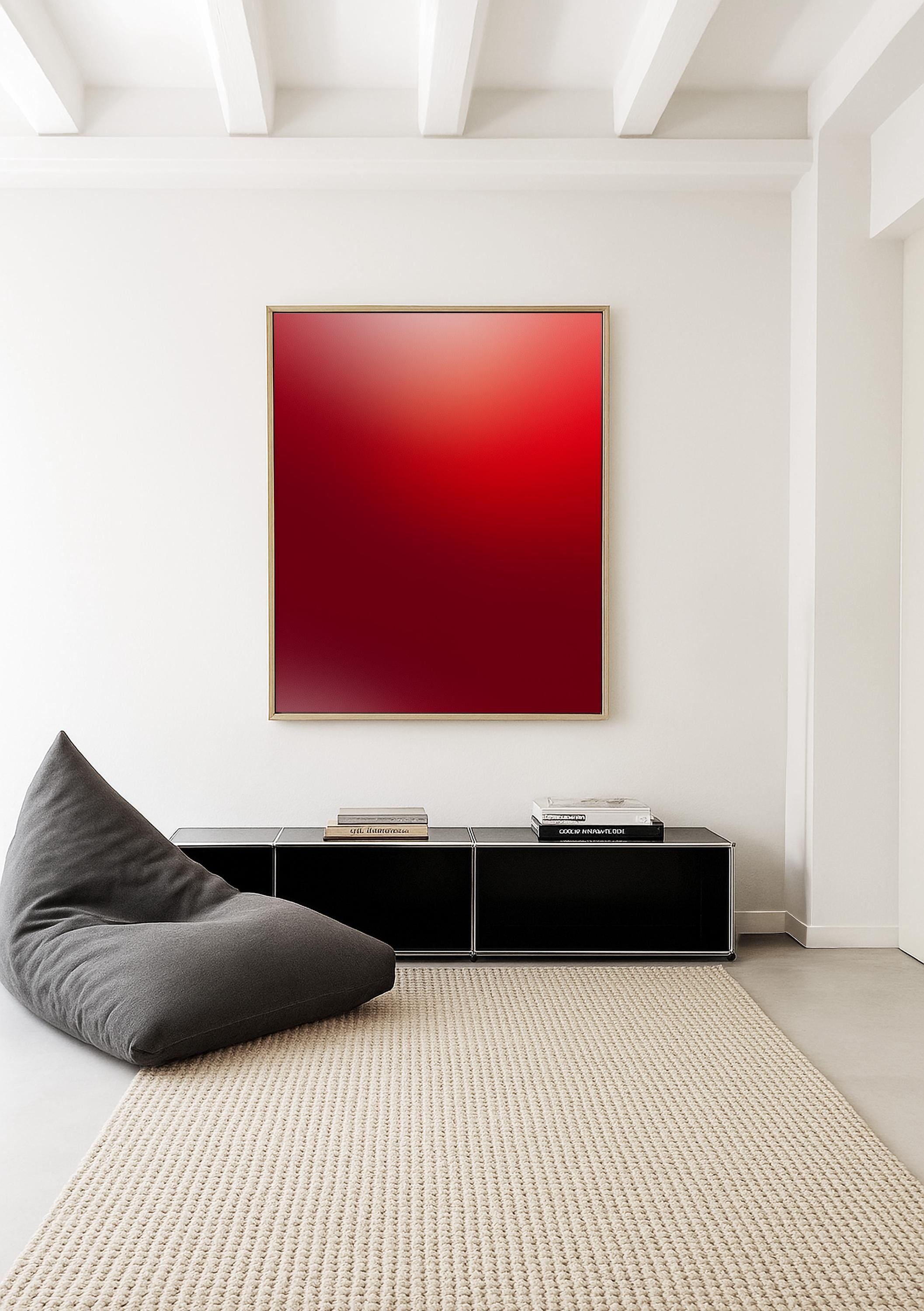 May include: A modern interior featuring a large framed artwork with a red gradient, a dark gray beanbag chair, and a black storage unit. A beige rug covers the floor. The room has white walls and ceiling beams.
