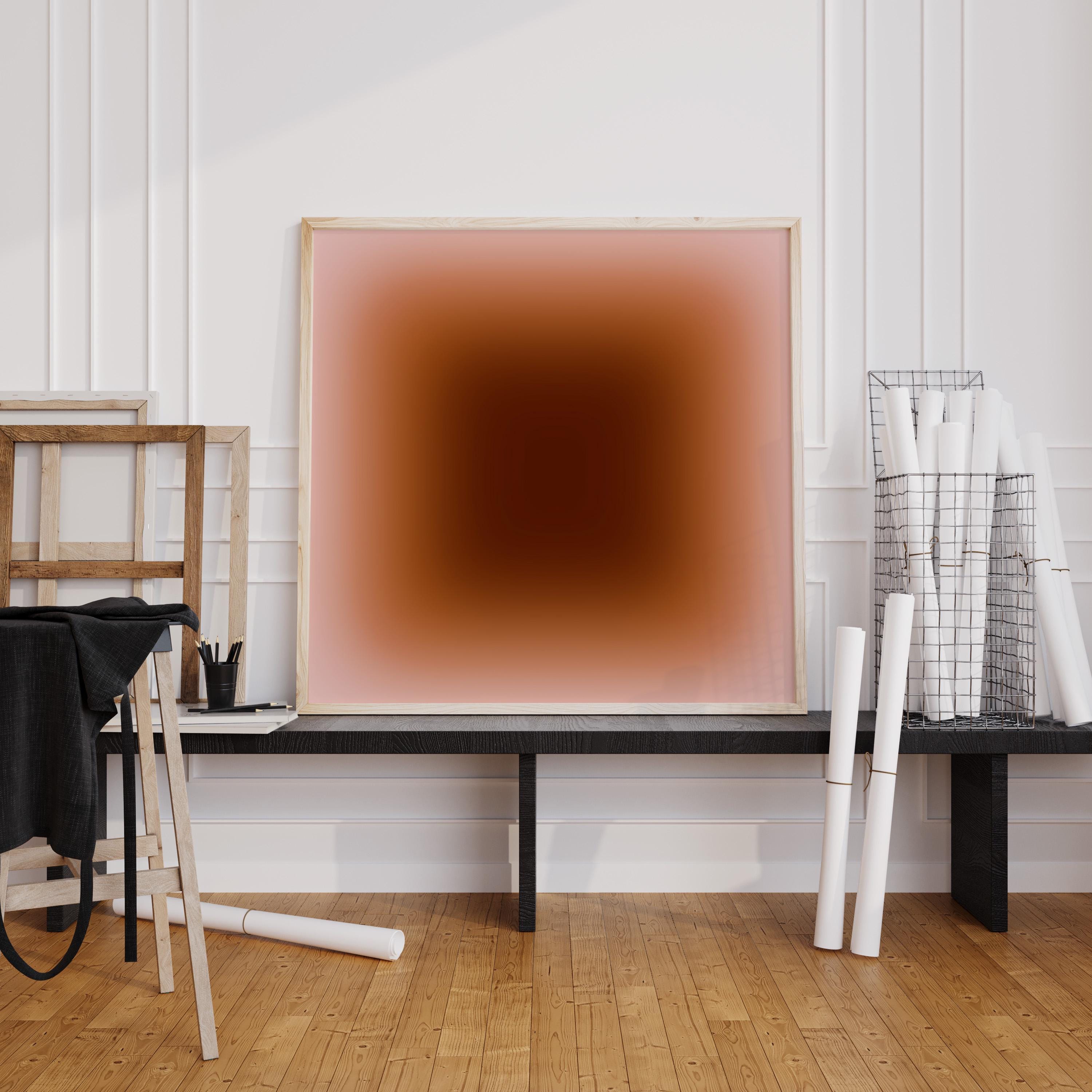 May include: A large framed artwork with a gradient of colors from light pink to dark brown. The artwork is displayed on a black bench. Rolls of white paper and a wire basket are also visible. The room has a wooden floor and white walls.