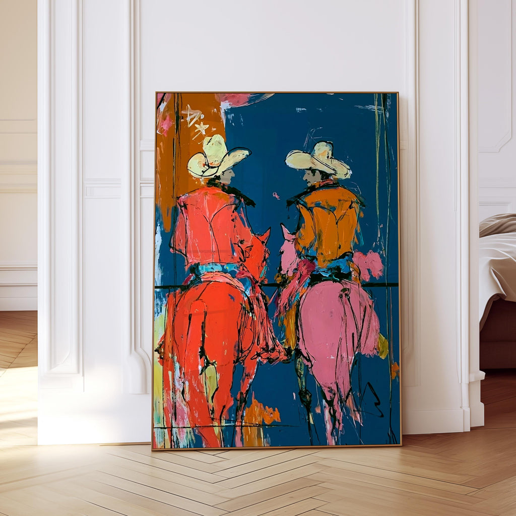 May include: Abstract painting of two cowboys on horseback, viewed from the back. The cowboys wear hats and jackets in shades of orange and yellow. The horses are pink and orange against a blue background.