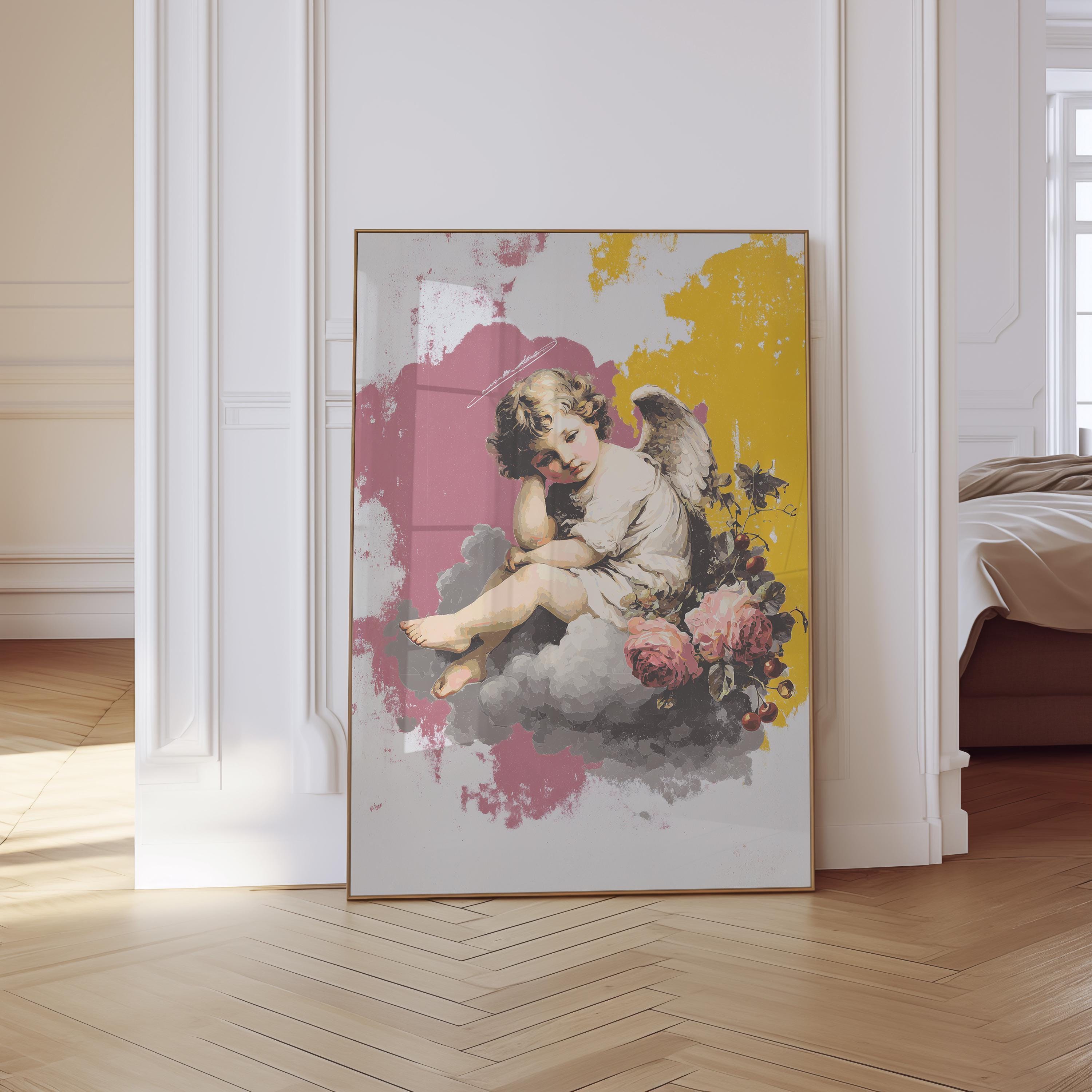 May include: A framed art print featuring a classical cherub seated on a cloud, surrounded by roses. The artwork has a vintage aesthetic with a color palette of pink, yellow, and gray. The cherub is depicted with wings and a halo.