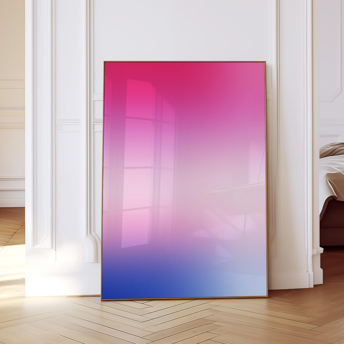 May include: A framed artwork with a gradient of pink, purple, and blue hues. The artwork is displayed against a white wall and a light-colored wooden floor. The frame is a warm brown color.