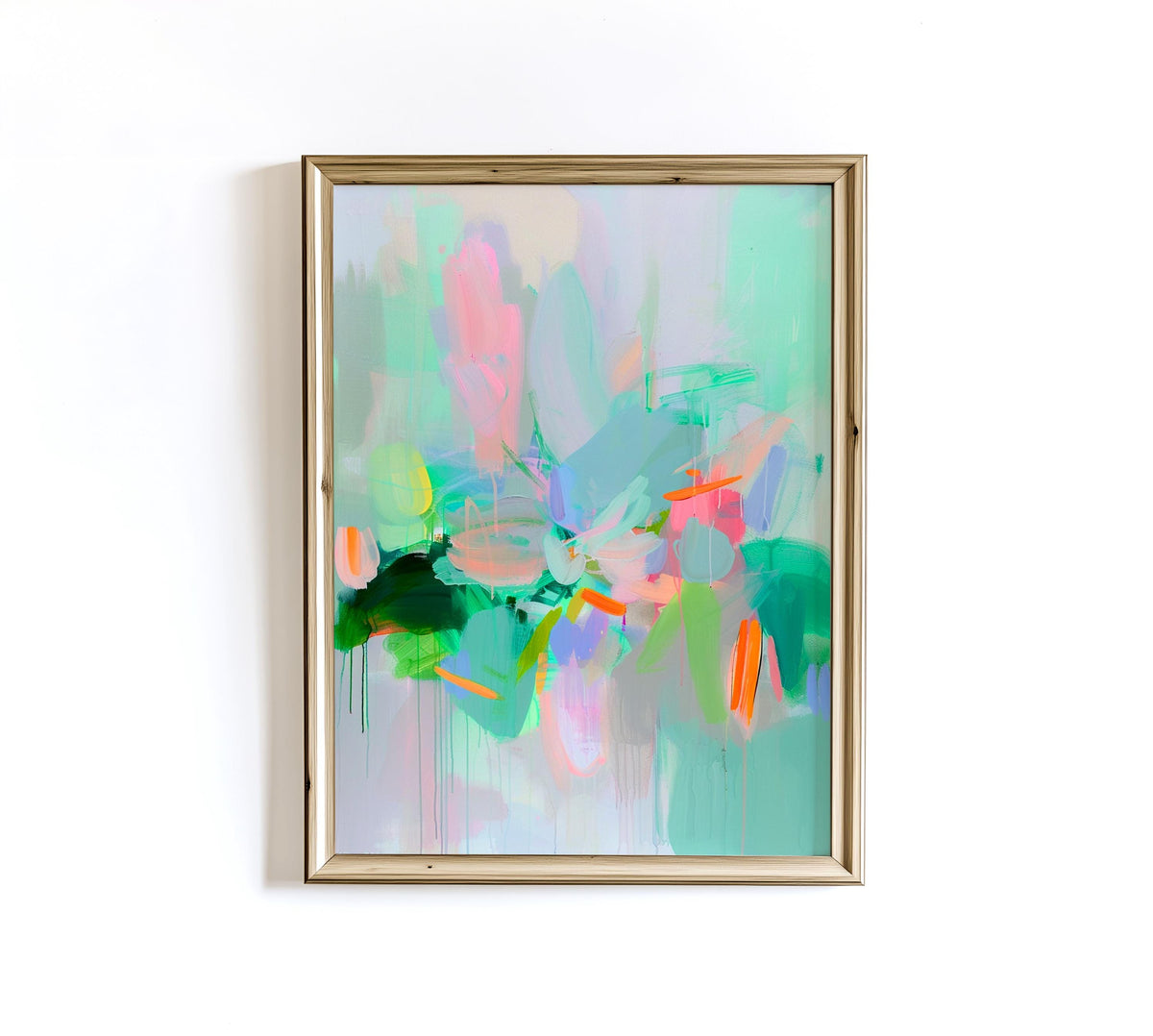 May include: Abstract art print in a gold frame. The artwork features a vibrant mix of colors, including shades of green, pink, blue, and orange. The brushstrokes create a dynamic and expressive composition, perfect for adding a pop of color to any space.