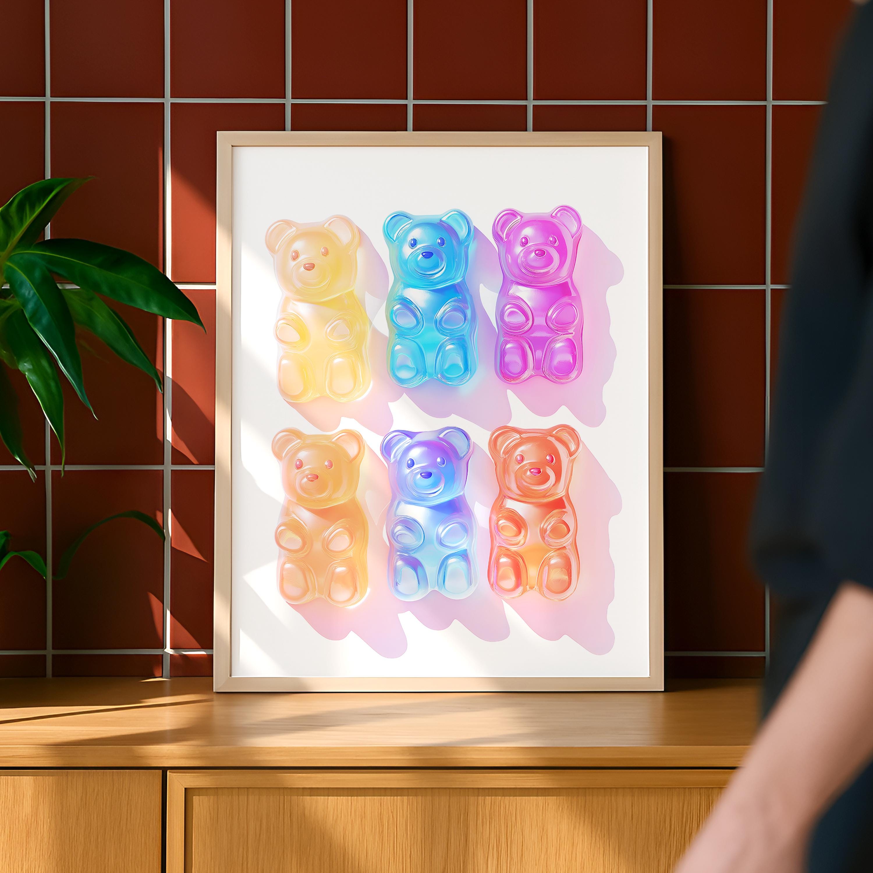 May include: A framed print of six gummy bear shaped candies in various colors, including yellow, blue, orange, and purple. The gummy bears are arranged in two rows of three, with each gummy bear facing forward.