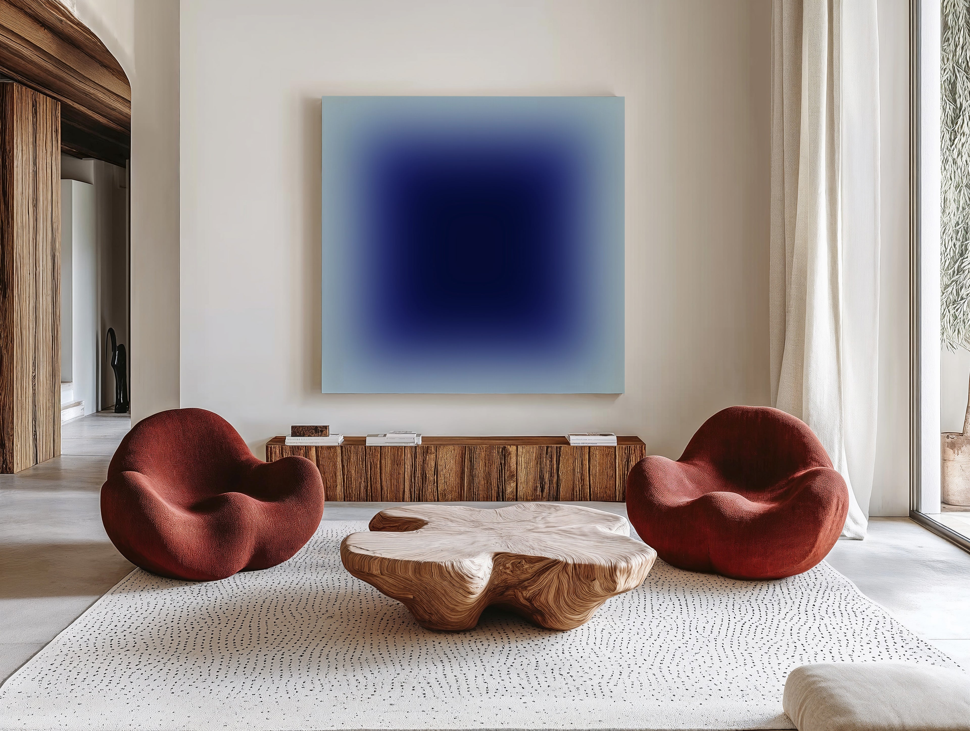 Large modern wall art featuring deep blue gradient square design in natural light interior.